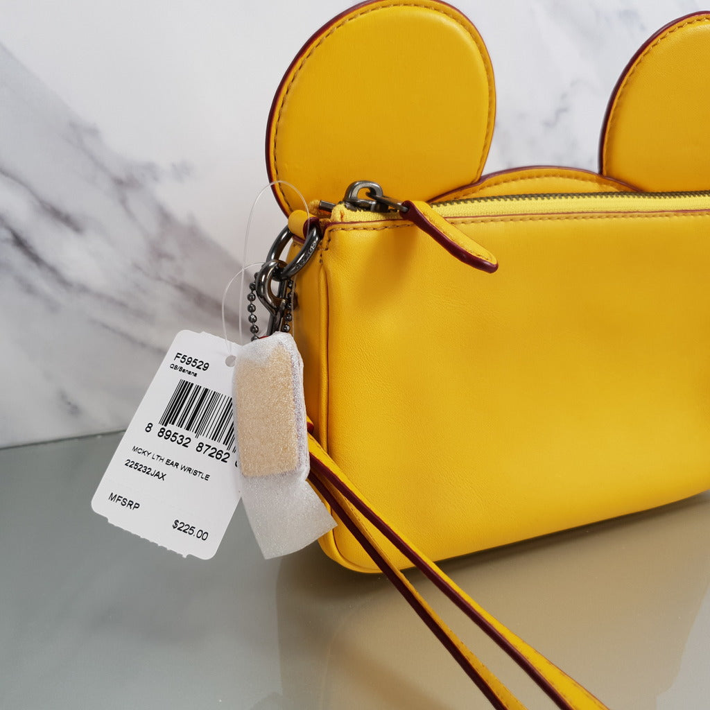 Coach wristlet mickey mouse Clearance