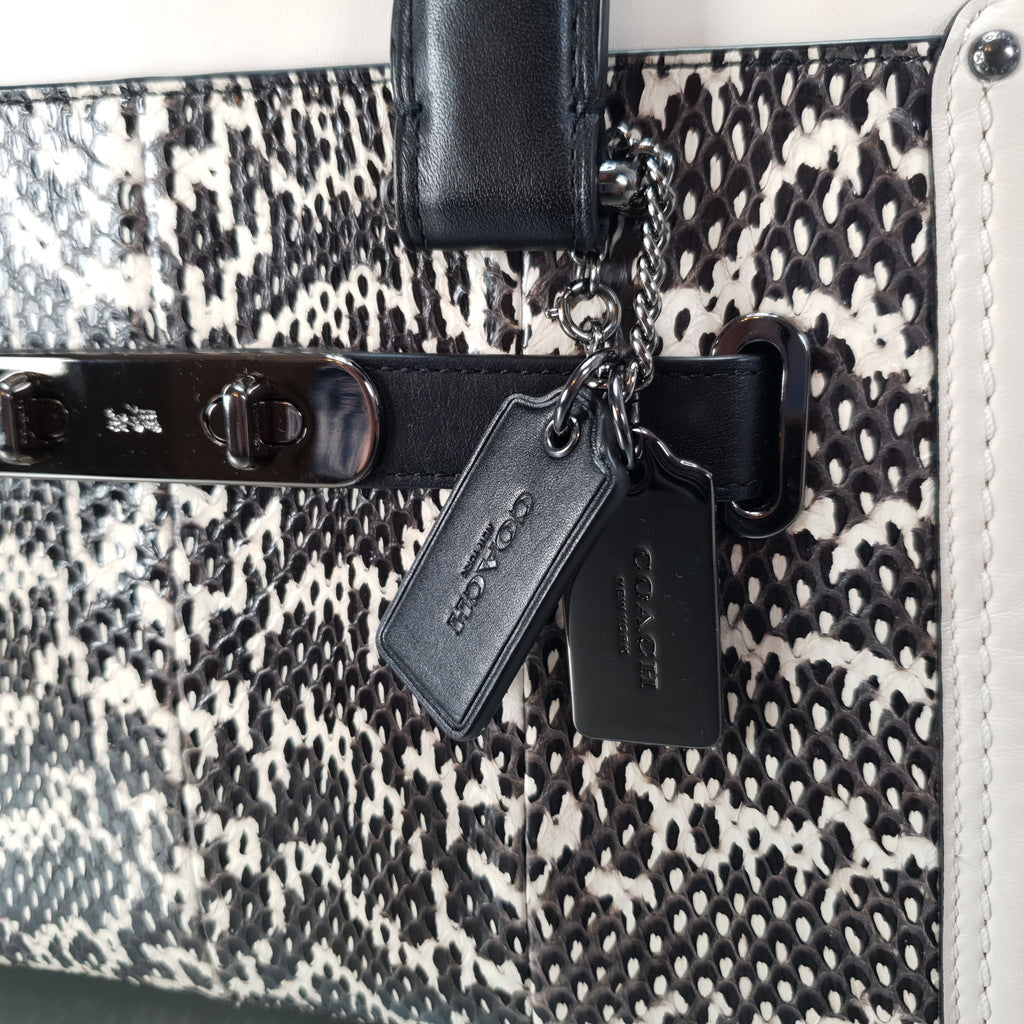 Black and white snakeskin best sale coach purse