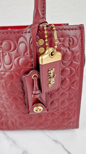 Coach Rogue 25 in Burgundy Signature Embossed Leather Floral Bow Lining - Coach 26839