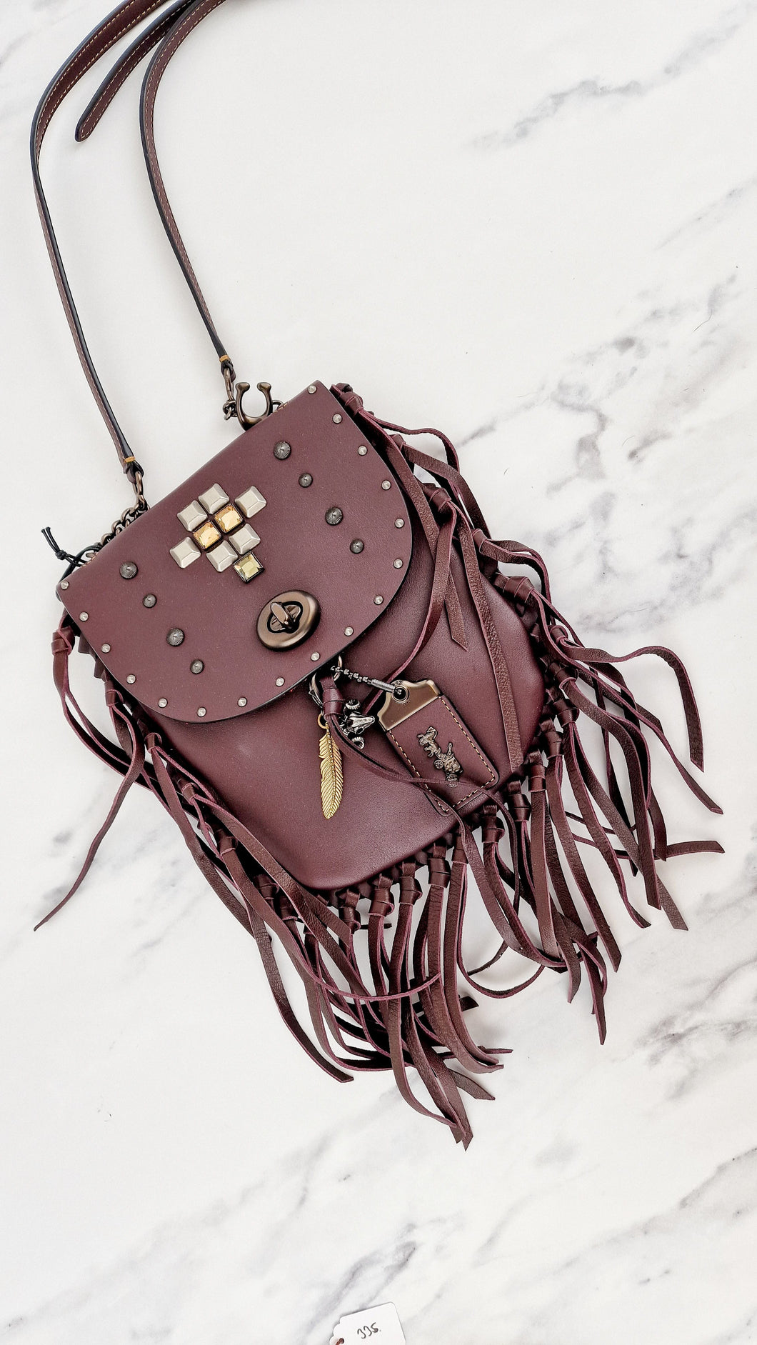 Coach 1941 Fringe Saddle Bag Pyramid Rivets in Oxblood Smooth Leather & Ram Charm - Coach 48617