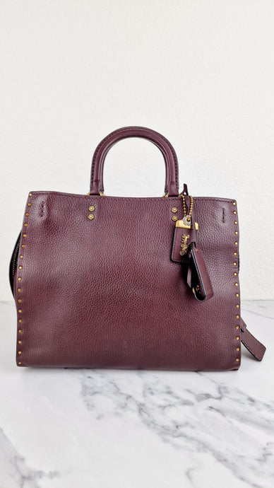 Coach 1941 Rogue 31 in Oxblood Pebble Leather with Border Rivets & Brass Hardware - Coach 30457