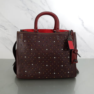 Coach 12164 Rogue 31 oxblood prairie rivets red suede studs colorblock