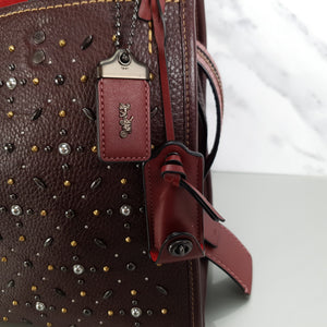 Coach 12164 Rogue 31 oxblood prairie rivets red suede studs colorblock
