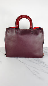 Coach 1941 Rogue 31 in Oxblood Pebble Leather with Red Suede Lining Satchel Handbag - Coach 38124