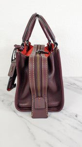 Coach Rogue 25 in Oxblood Pebble Leather with Red Suede Lining - Coach 54536