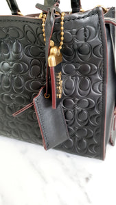 Coach Rogue 25 in Black Signature Embossed Leather with Burgundy Floral Bow Leather Lining - Coach 26839