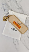 Load image into Gallery viewer, Coach x Jean-Michel Basquiat Empire Bag Charm in Ivory Smooth Leather
