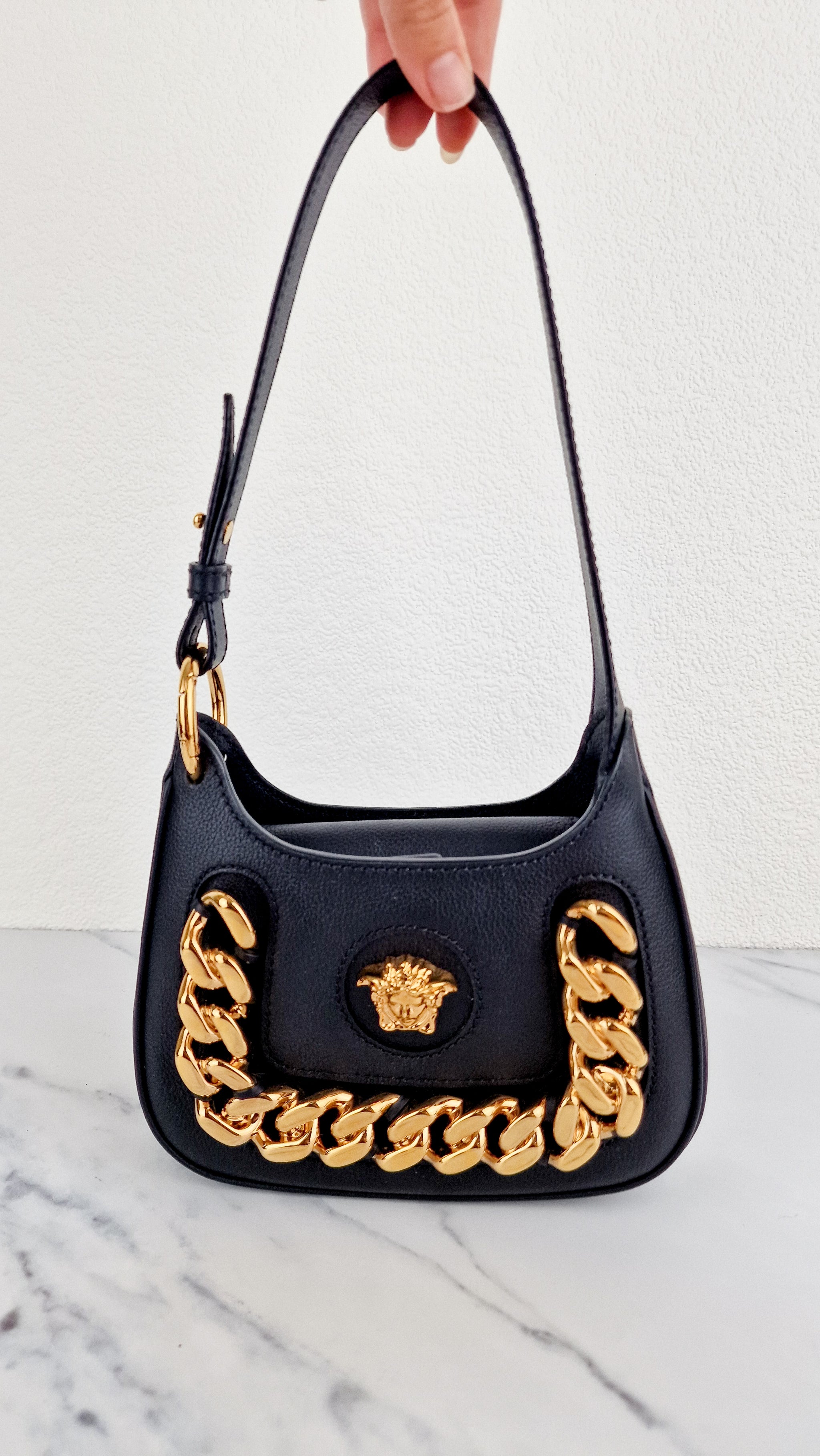 Versace black bag with gold chain sale