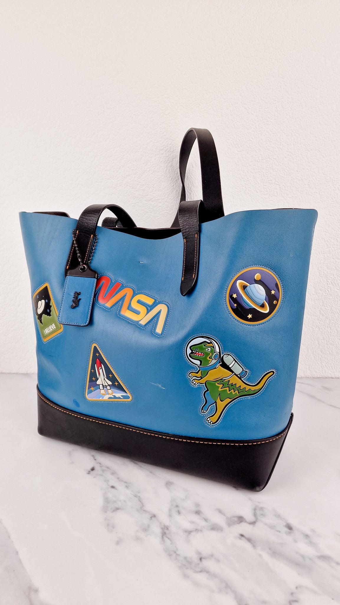 coach backpack t rex RARE Coach 1941 Gotham Tote with Space Patches Nasa Bag With Space Rex – Essex Fashion House