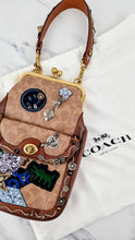 Load image into Gallery viewer, Limited Edition Coach x Keith Haring 1941 Frame Kisslock Clutch Pouch with Patchwork &amp; Embellishments in Signature &amp; Saddle Brown - Charms, Rexy, Crystals, Rivets, Tea Roses - Coach 31068
