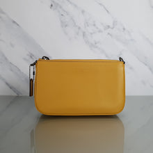Load image into Gallery viewer, Coach Nollita Mustard Yellow Handbag Glovetanned Leather Wristlet
