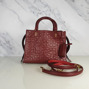 Coach Rogue 25 in Burgundy Signature Embossed Leather with Floral Bow Lining 26839