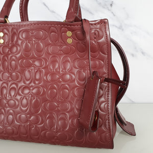 Coach Rogue 25 in Burgundy Signature Embossed Leather with Floral Bow Lining 26839