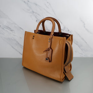 Coach 1941 Rogue 31 in Light Saddle Brown Pebbled Leather & Burgundy Suede Lining - SAMPLE BAG