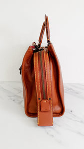 Coach 1941 Rogue 31 Bag in Saddle Brown Pebble Leather & Wine Burgundy Suede Lining Coach 38124