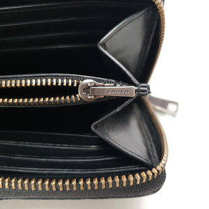 Coach accordion zip wallet in snakeskin leather