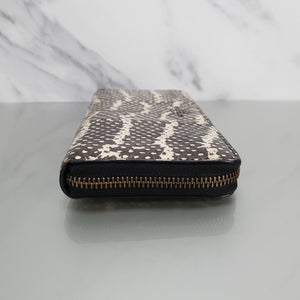 Coach accordion zip wallet in snakeskin leather
