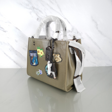 Load image into Gallery viewer, Disney x Coach Rogue 25 Dark Fairytale Army Green Snow White
